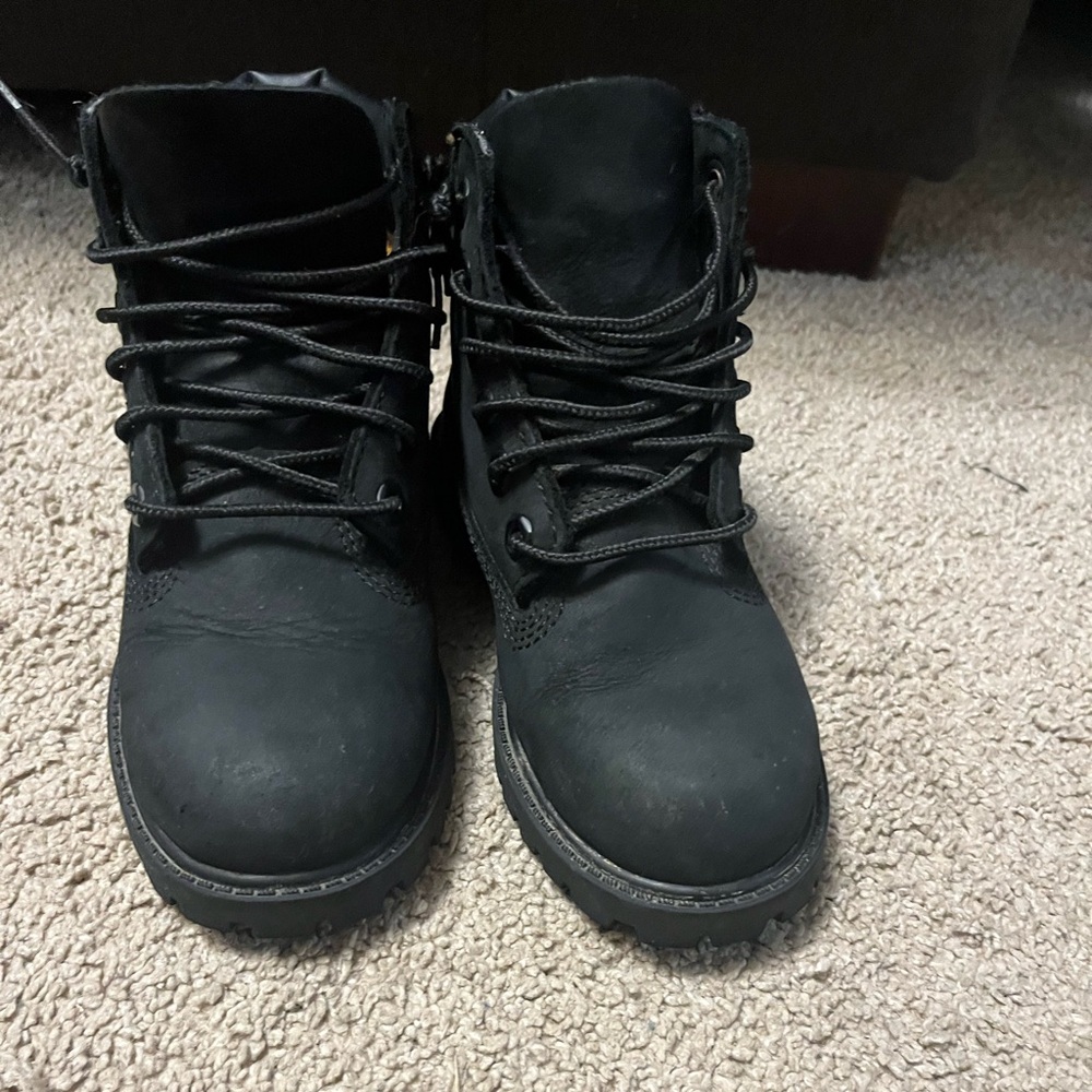 Boys size 11 timberland black leather boots. Only worn a couple of times